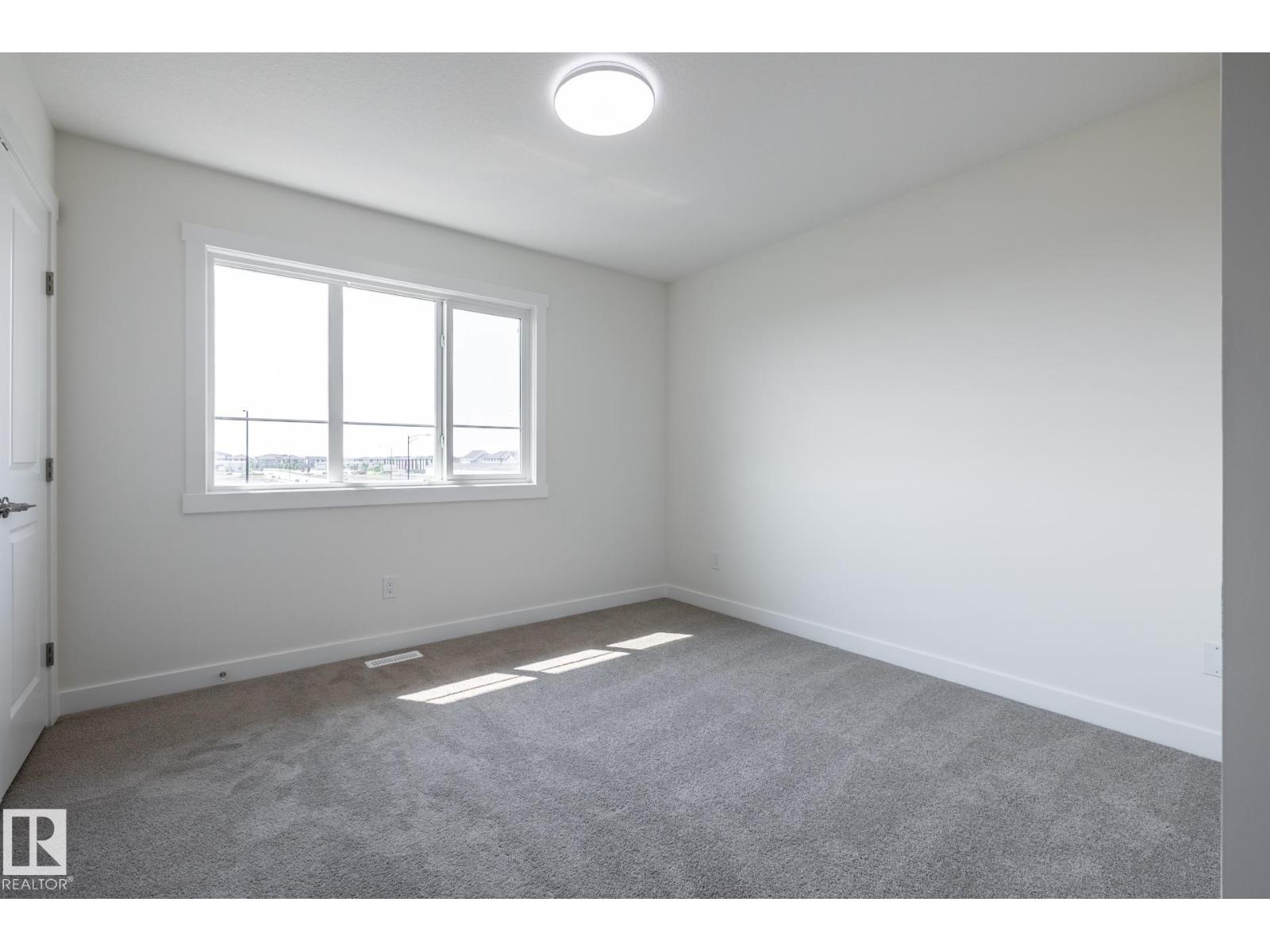 #24 7020 Keswick Cm Sw Property Photo 8