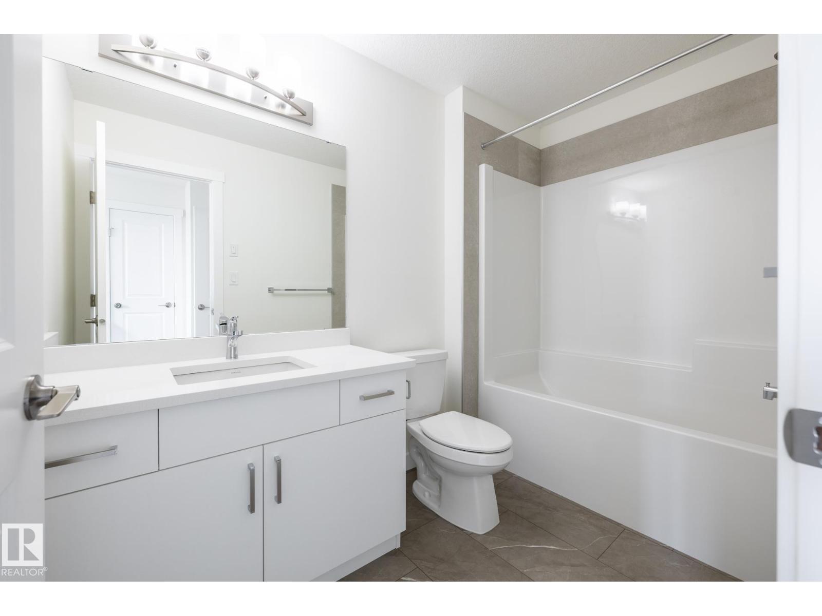 #24 7020 Keswick Cm Sw Property Photo 10