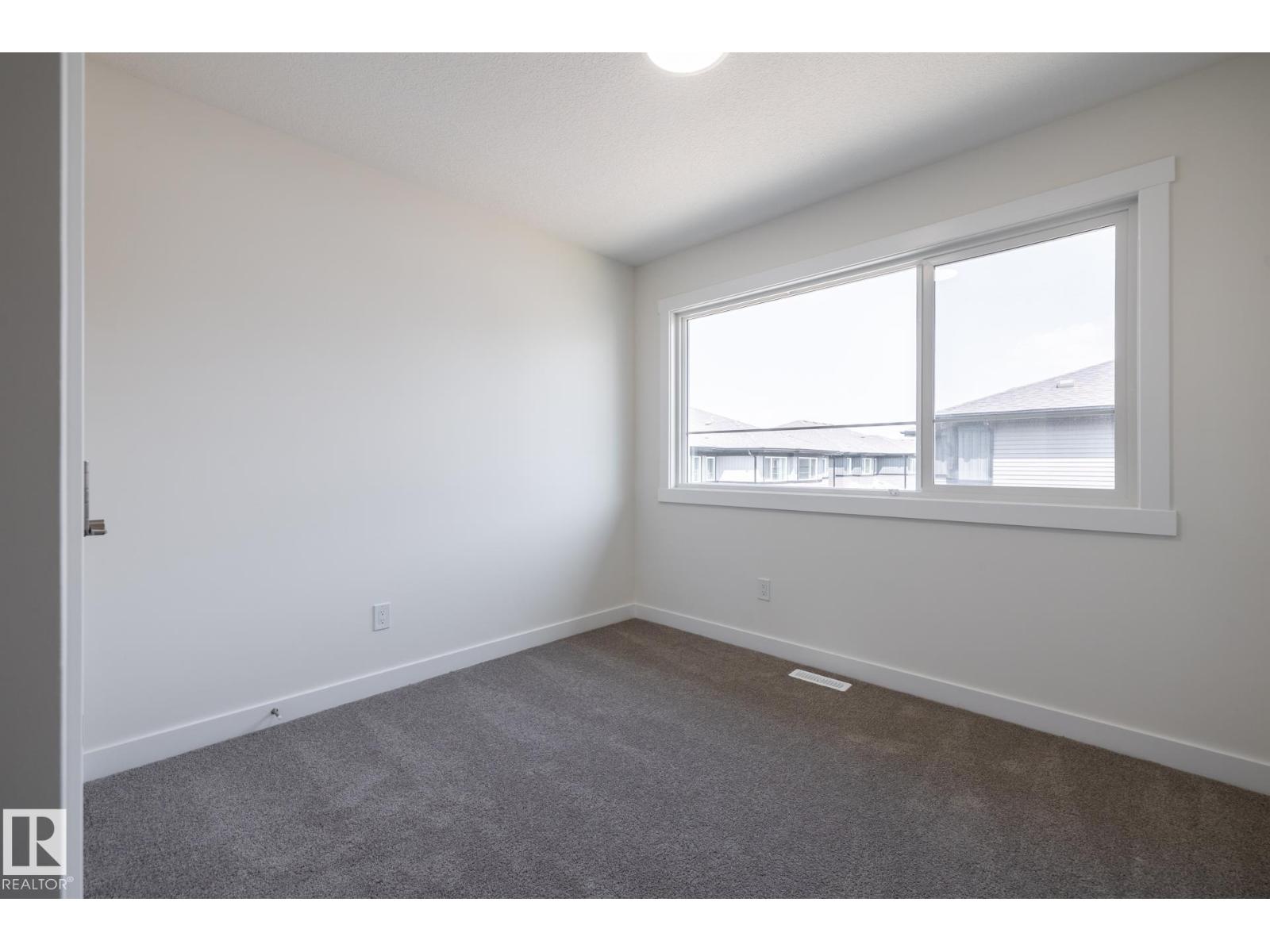 #24 7020 Keswick Cm Sw Property Photo 12