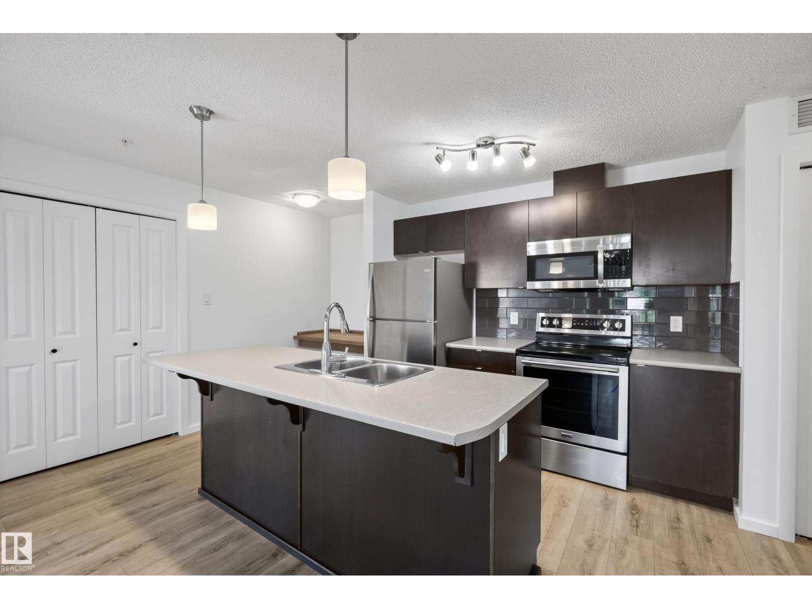 #319 508 Albany WY NW Property Photo 1
