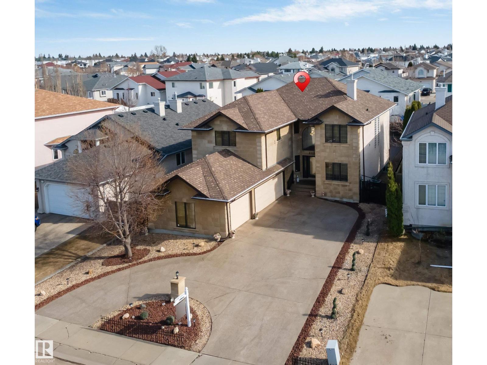 8715 160A AV NW