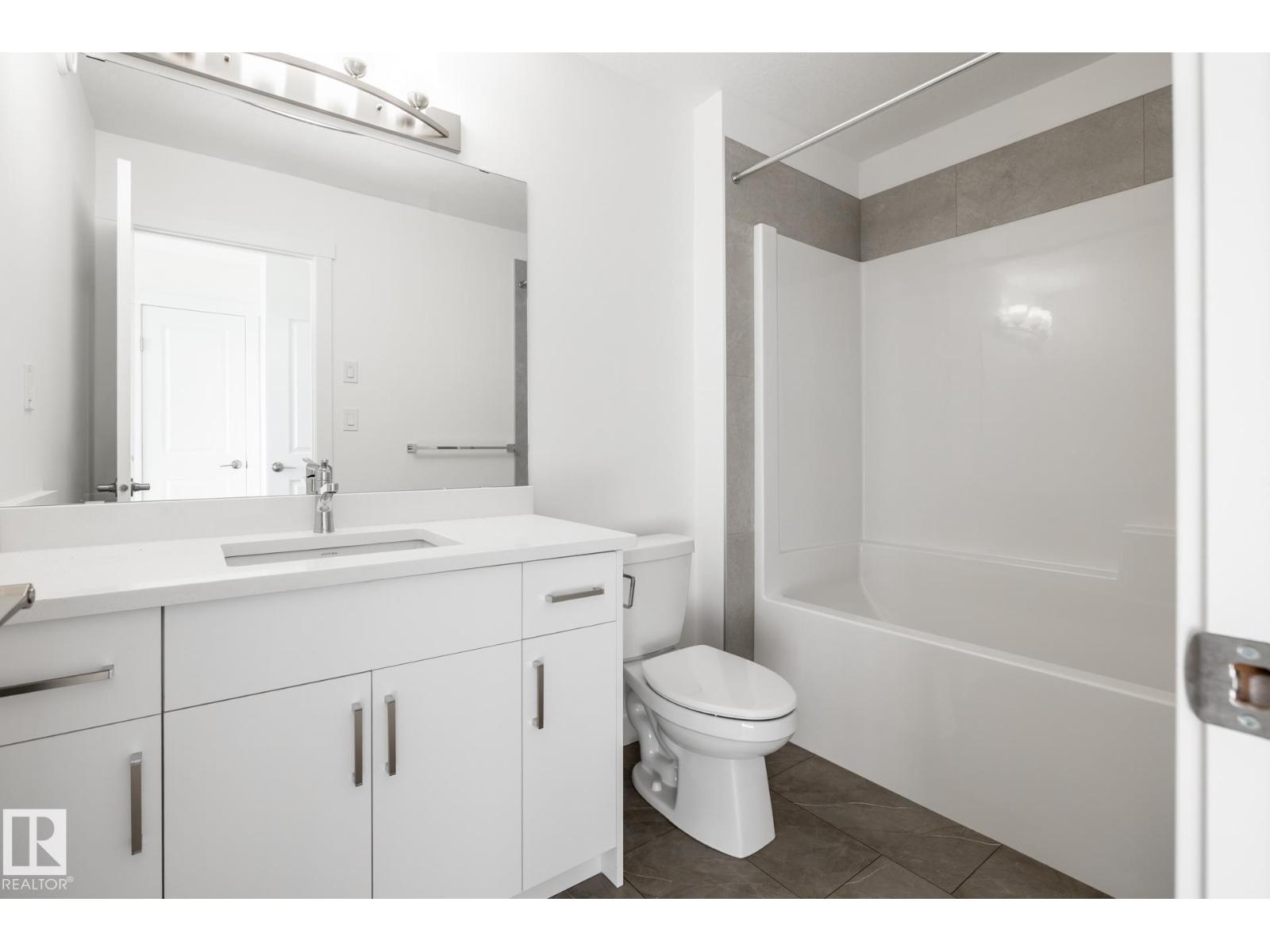 #37 7110 Keswick Cm Sw Property Photo 22