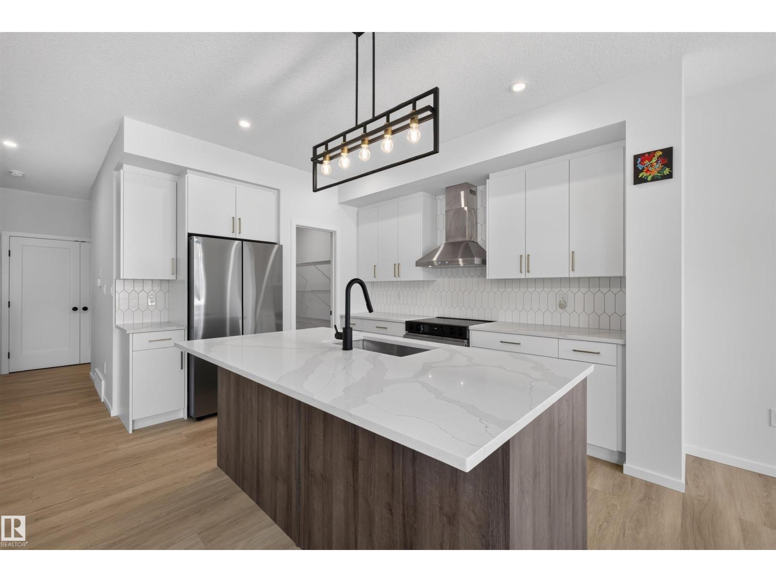 7722 174a Av Nw Property Photo 1