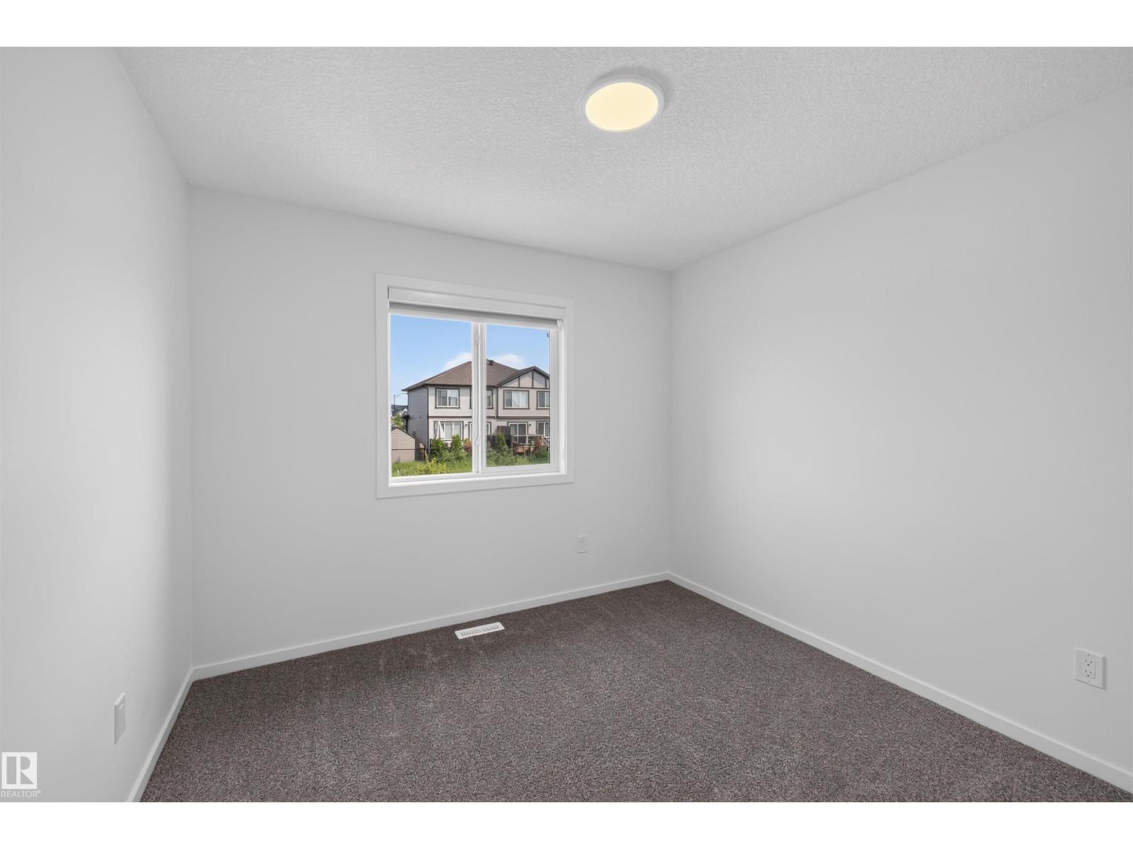 7722 174a Av Nw Property Photo 19