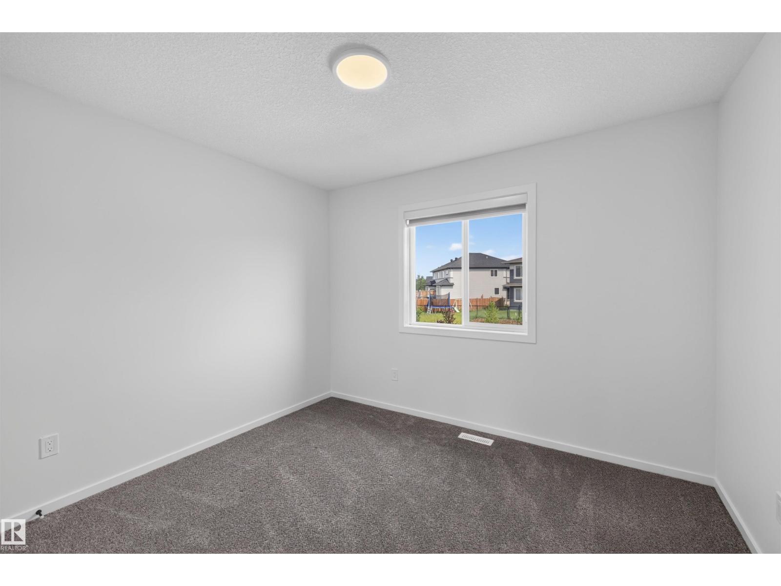 7722 174a Av Nw Property Photo 23