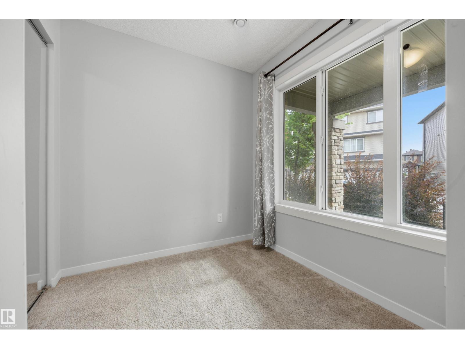 #102 1530 Tamarack Bv Nw Property Photo 6