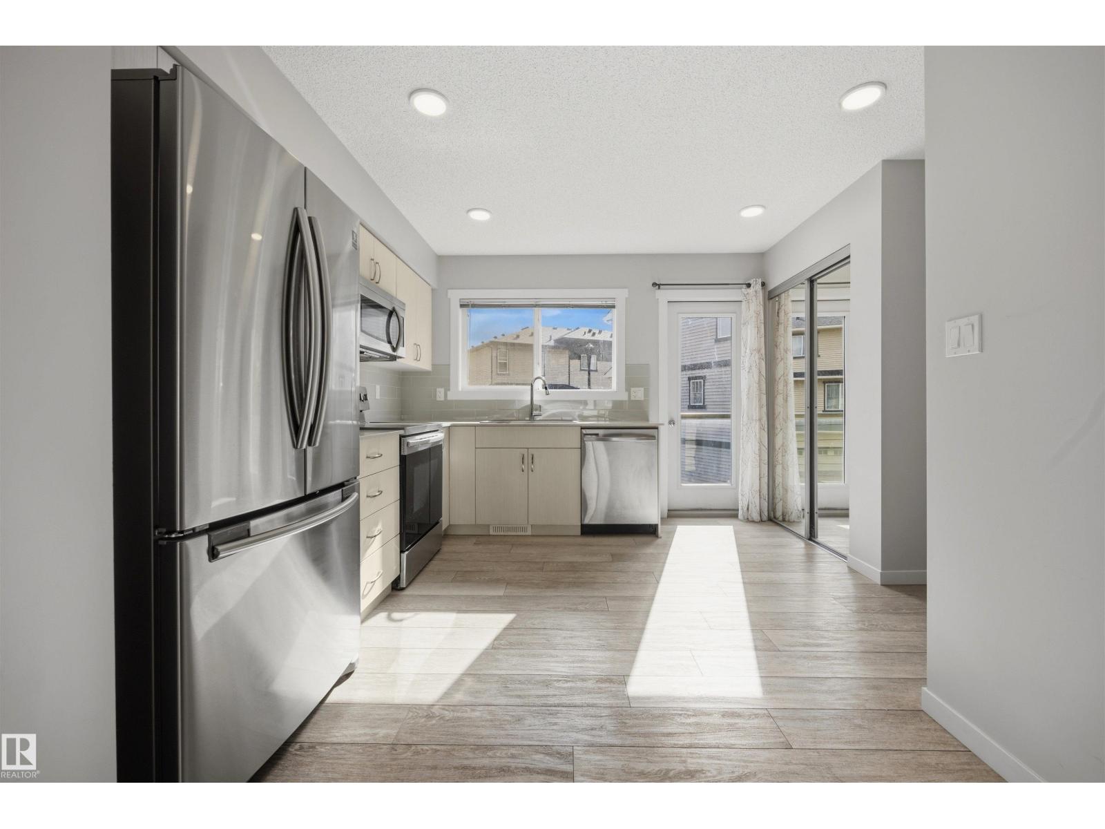 #102 1530 Tamarack Bv Nw Property Photo 16