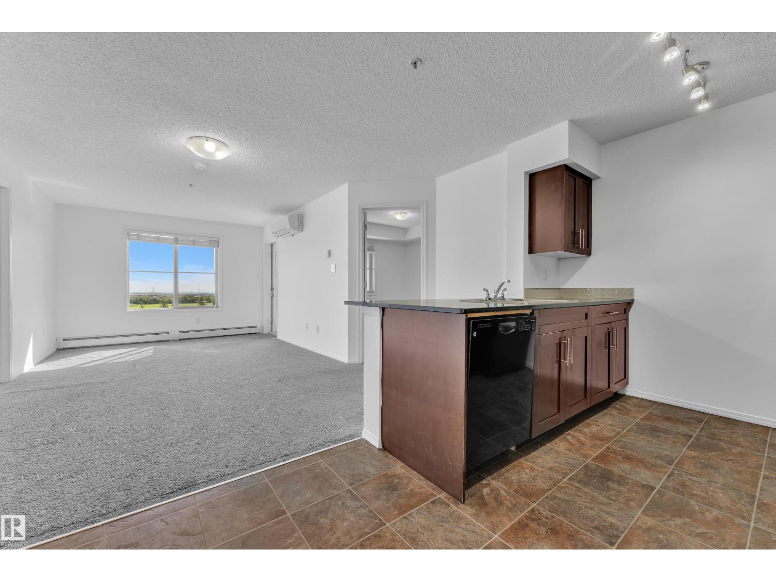 #323 274 MCCONACHIE DR NW Property Photo 1