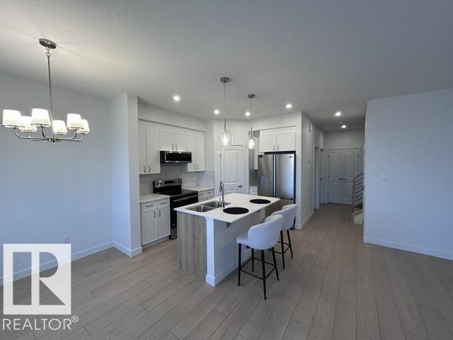 20936 16 Av Nw Property Photo 3