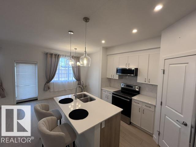 20936 16 Av Nw Property Photo 4