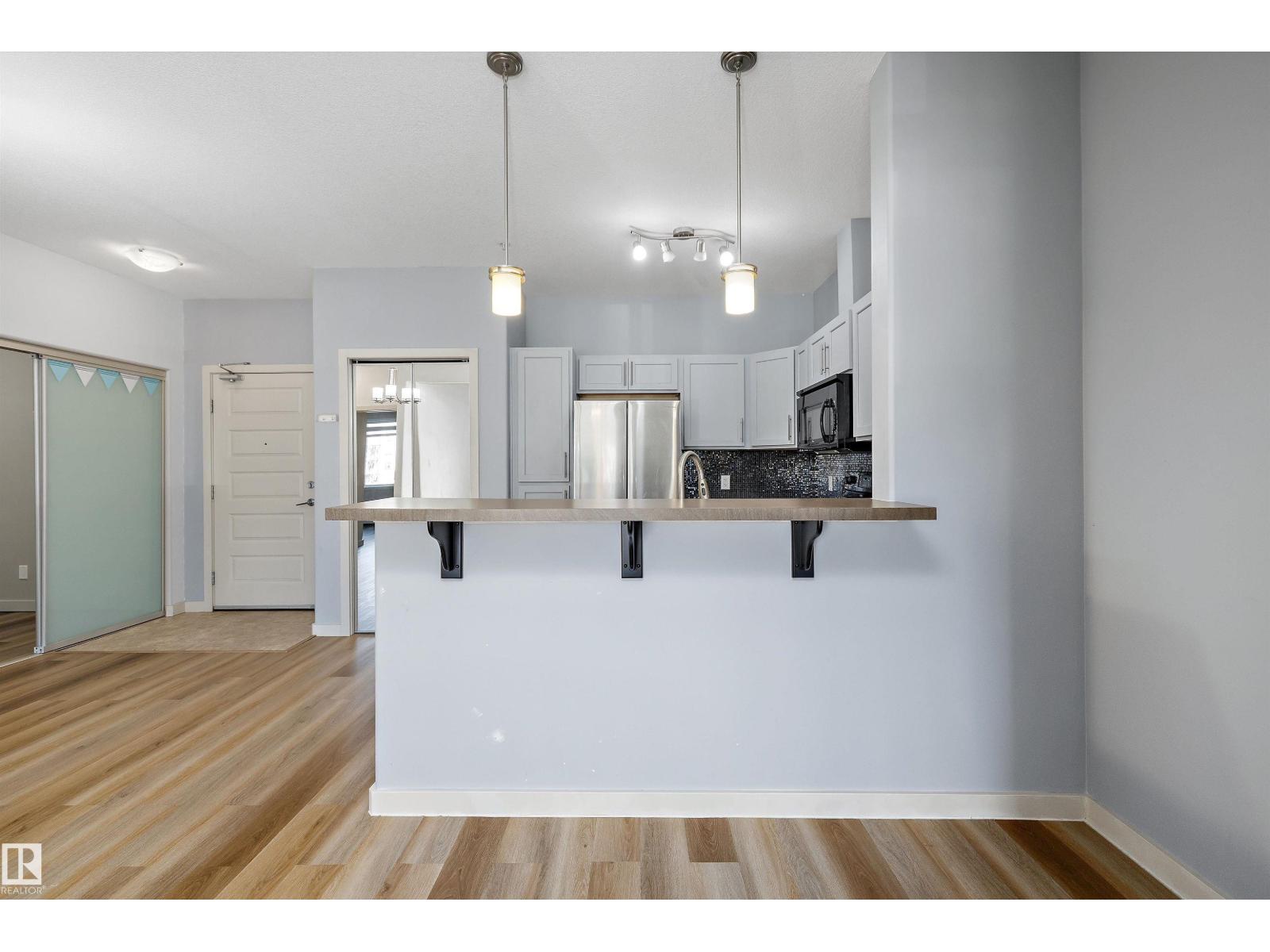 #207 304 Ambleside Li Sw Sw Property Photo 14