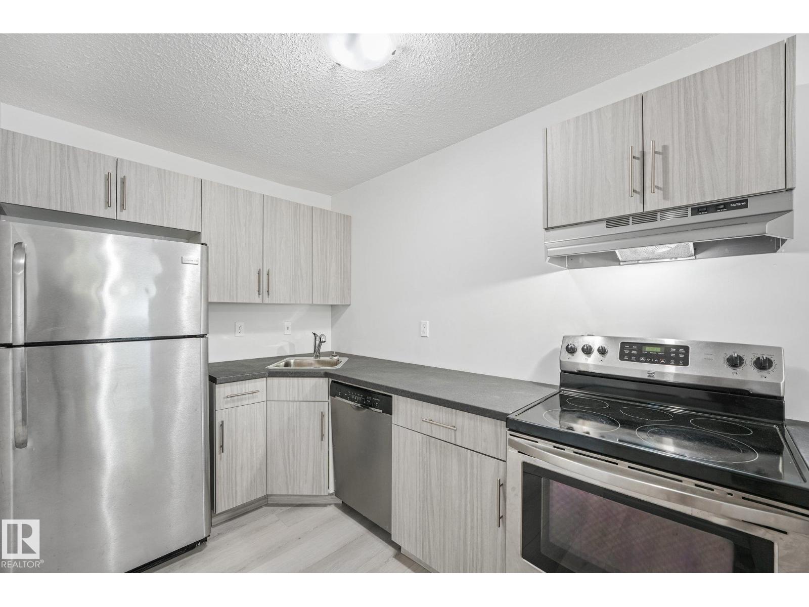 #101 7915 112 Av Nw Property Photo 1