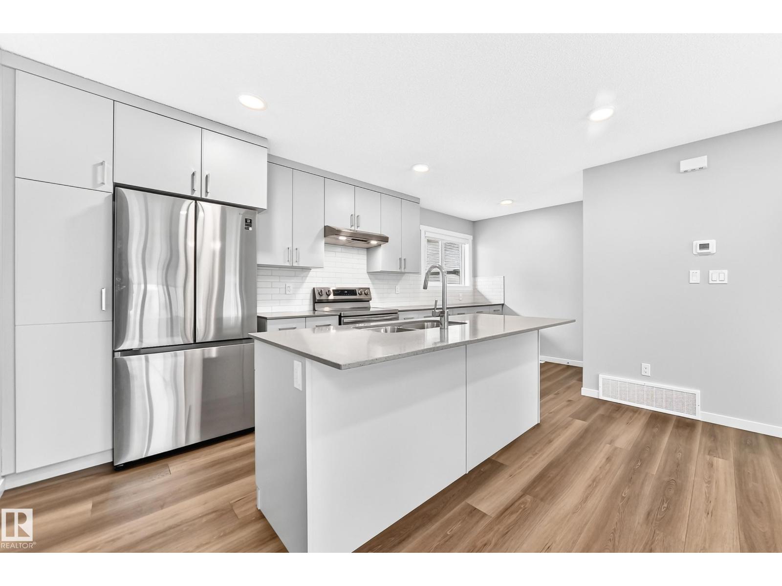 #117 1530 Tamarack Bv Nw Property Photo 5