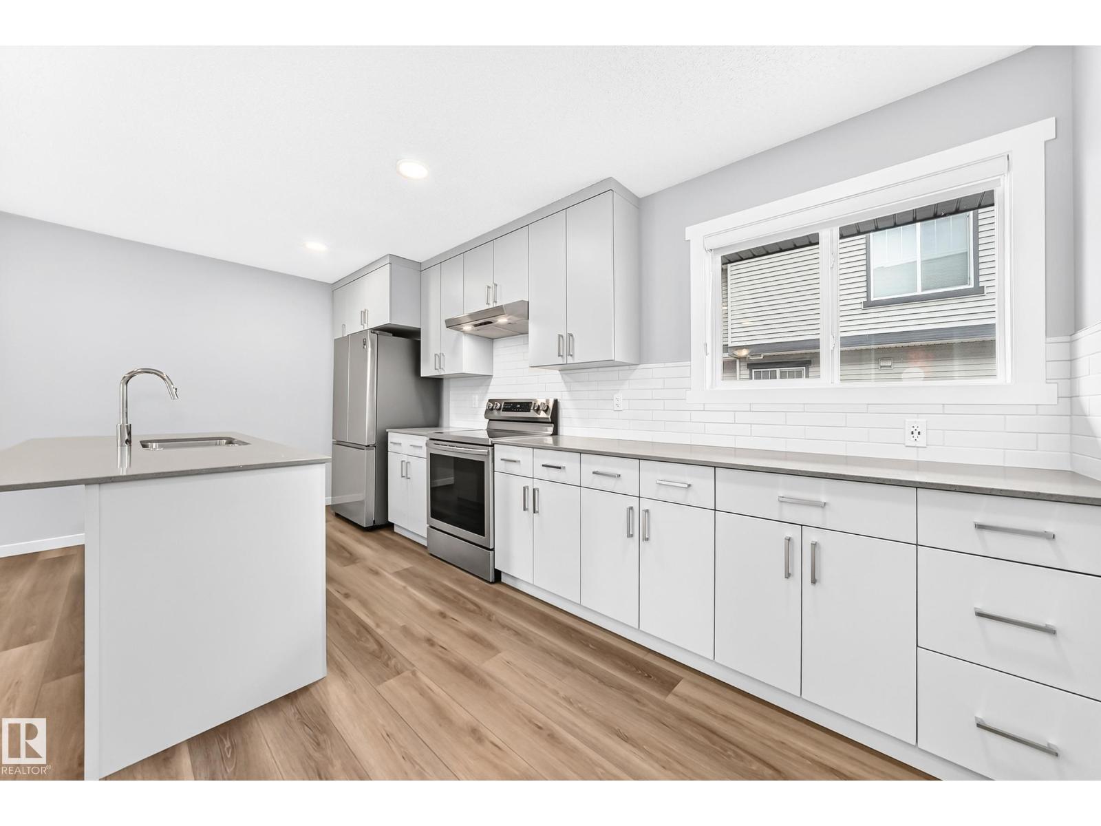 #117 1530 Tamarack Bv Nw Property Photo 7