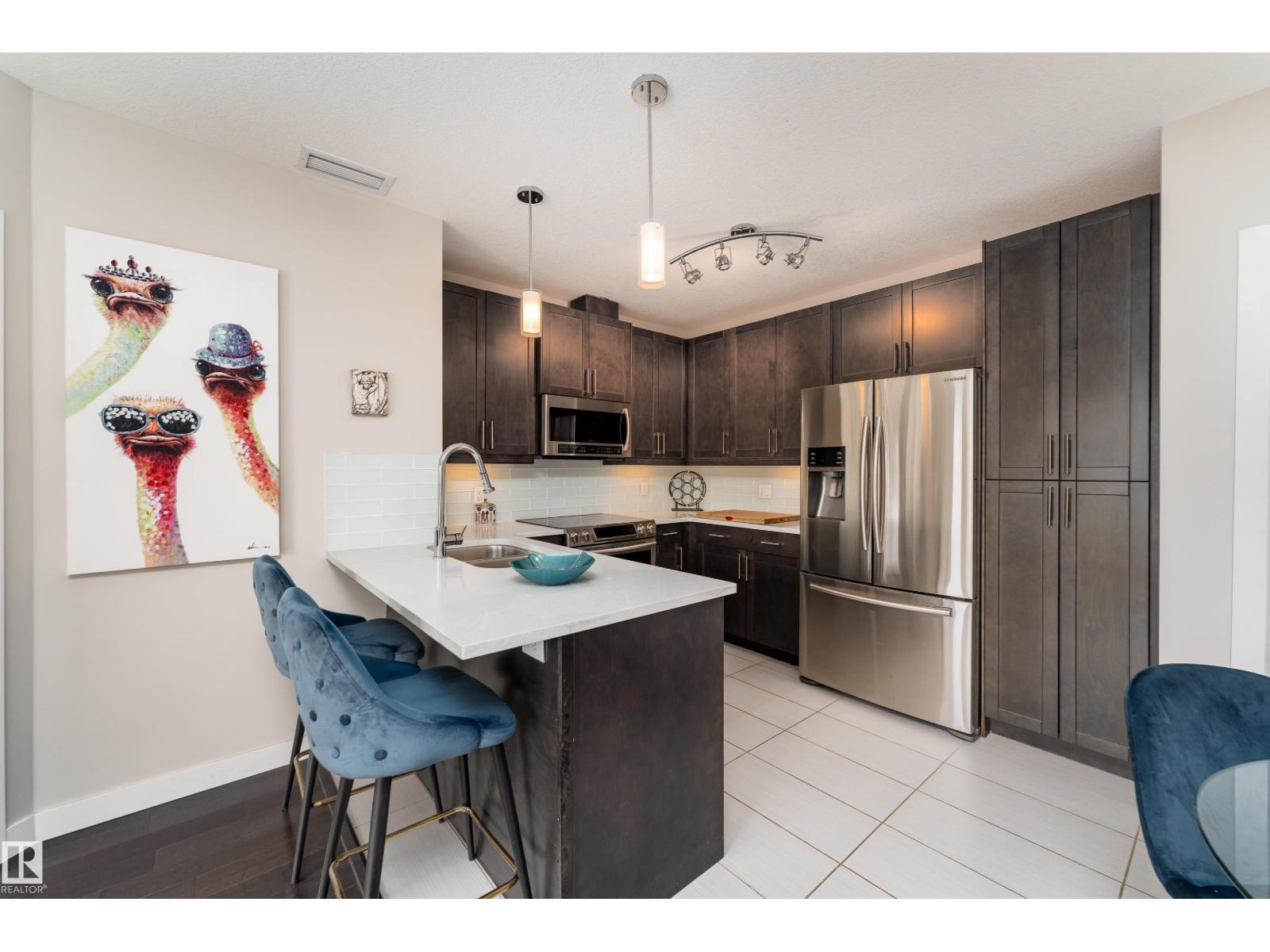 #203 5151 Windermere Bv Sw Property Photo 4