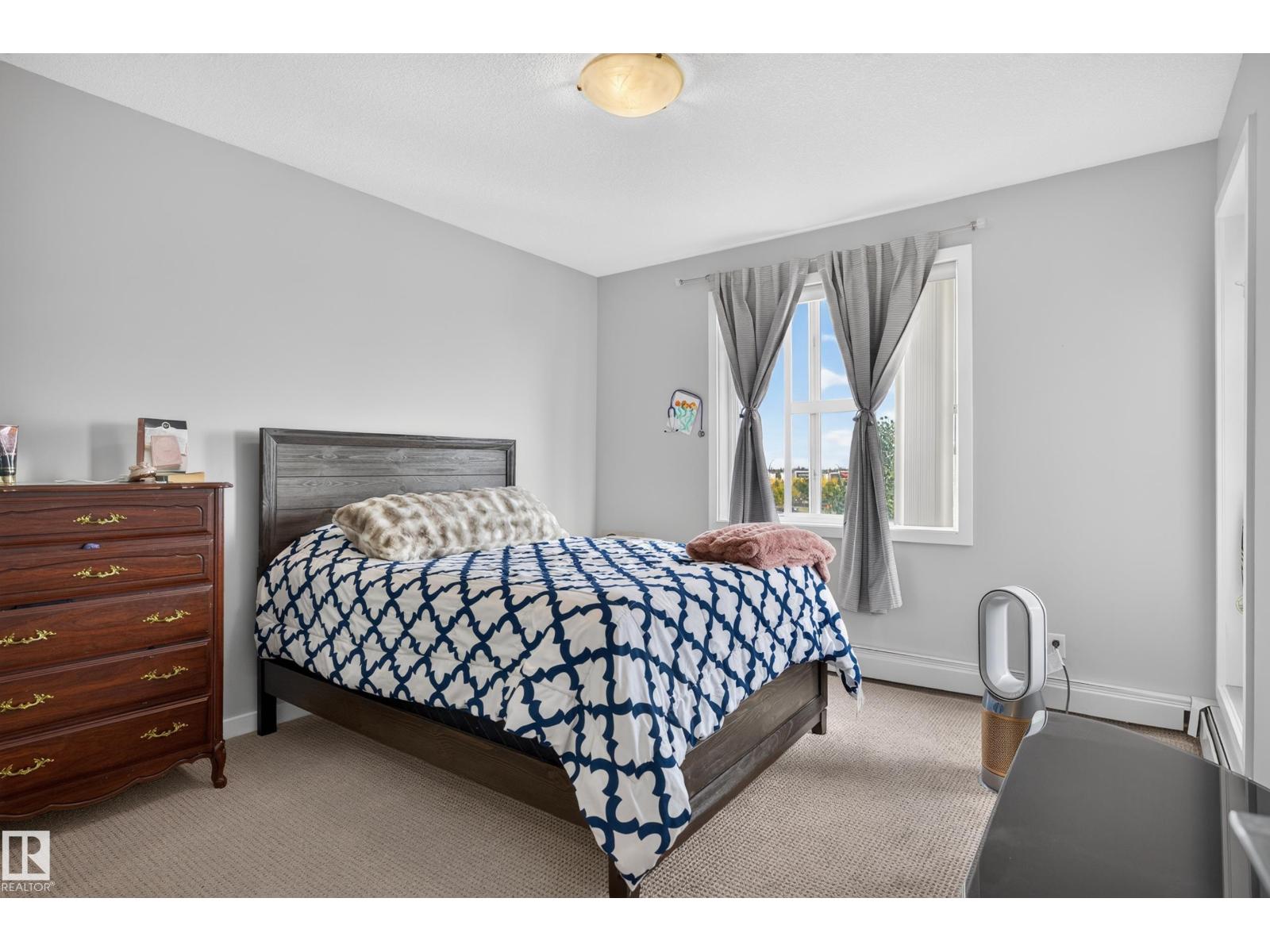 #411 304 Ambleside Link Li Sw Property Photo 22