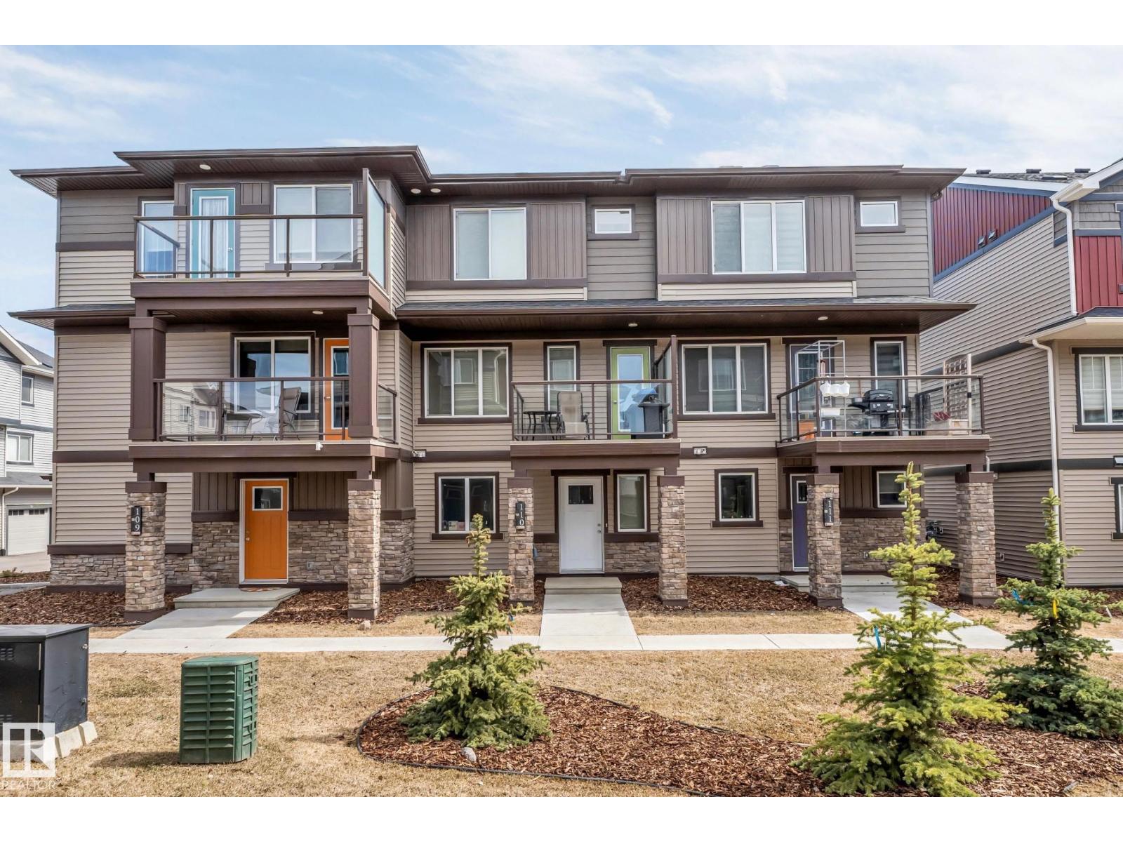 #110 1530 TAMARACK BV NW Property Photo 1