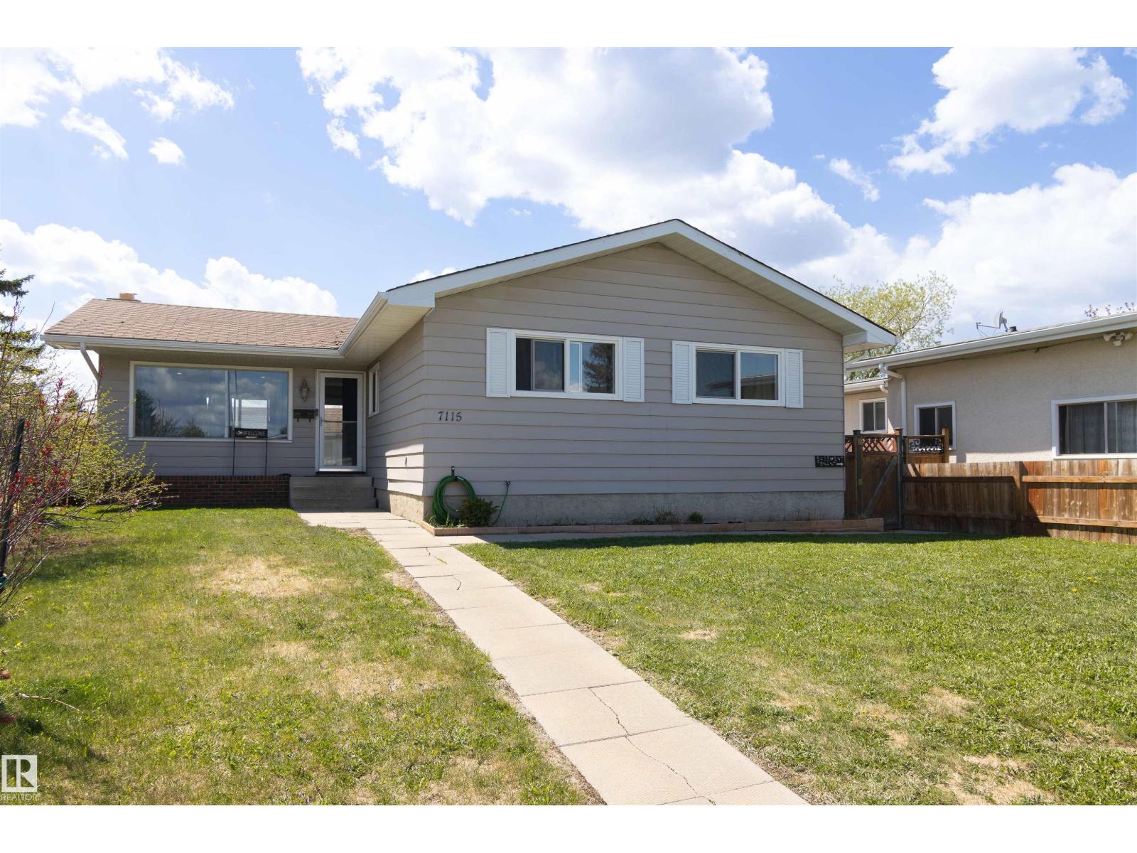 7115 39a Av Nw Property Photo 1