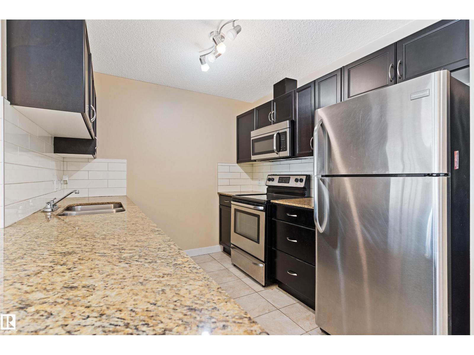 #103 12660 142 Av Nw Property Photo 10