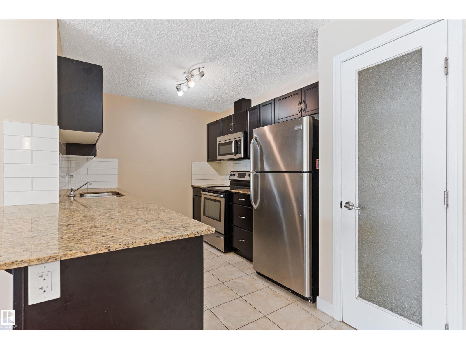#103 12660 142 Av Nw Property Photo 11