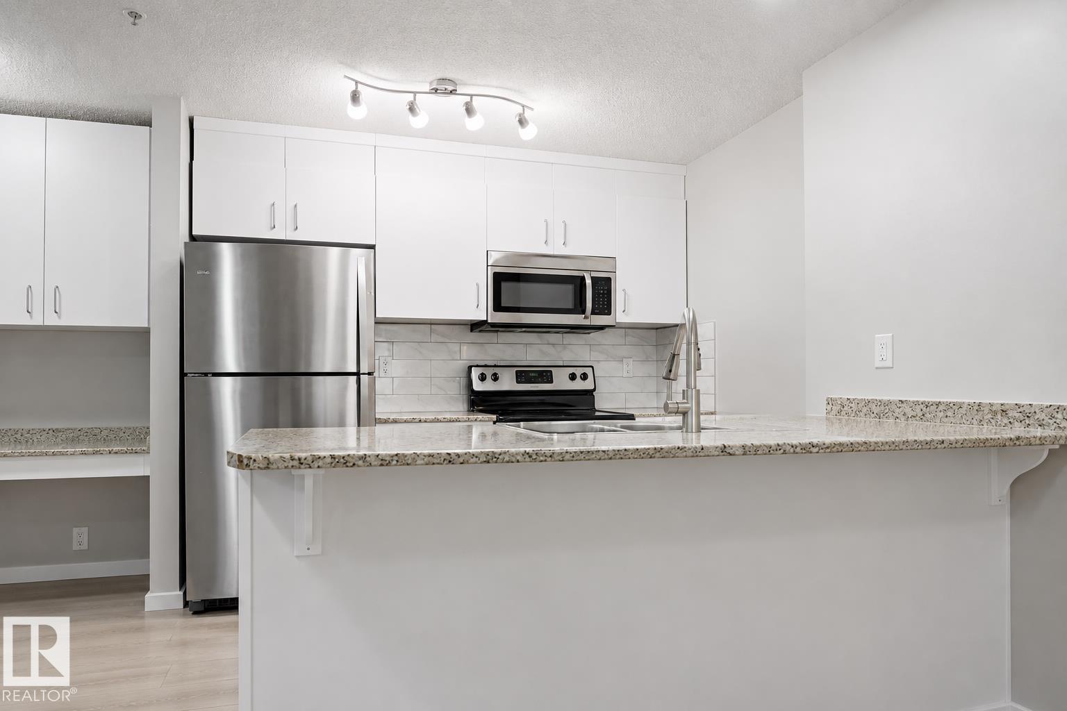 #127 5515 7 Av Sw Property Photo 2