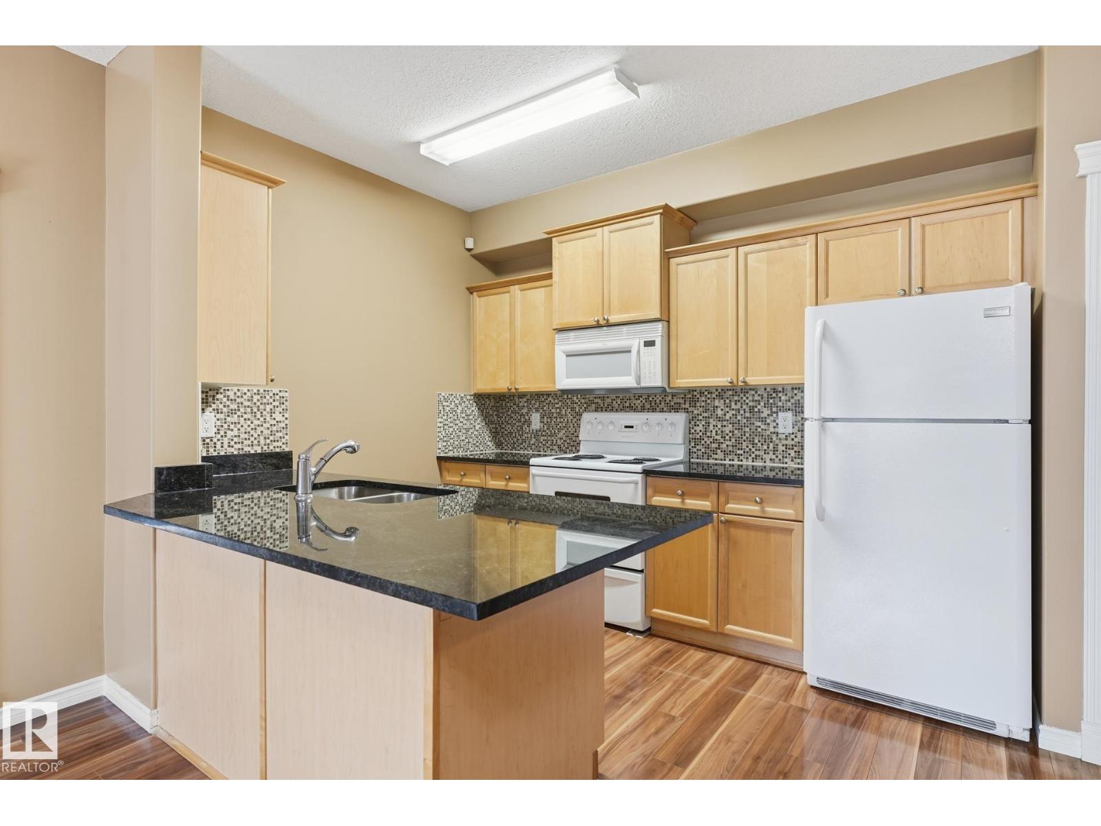 #102 16715 100 Av Nw Property Photo 4