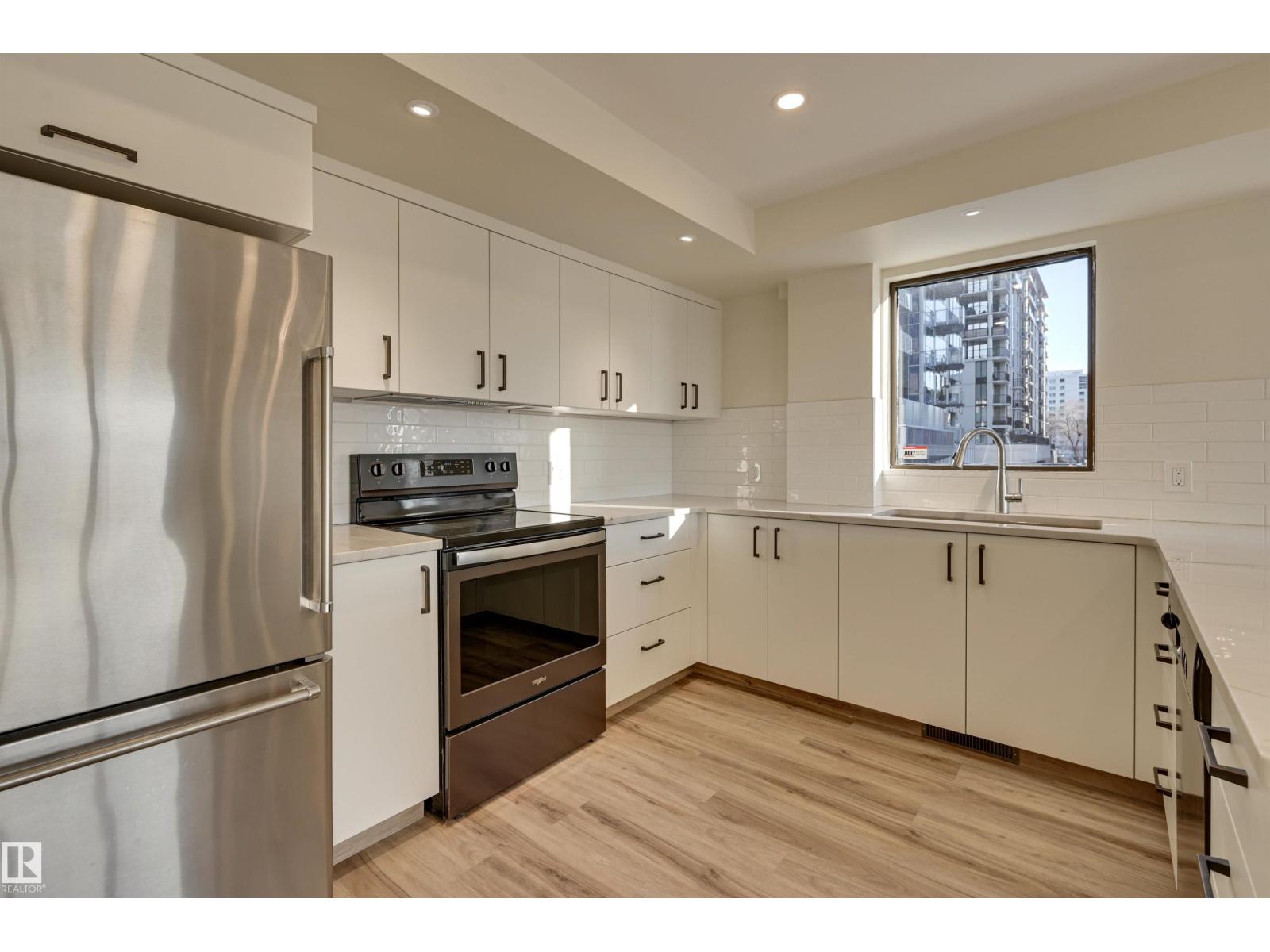 #1 11960 100 Av Nw Property Photo 18