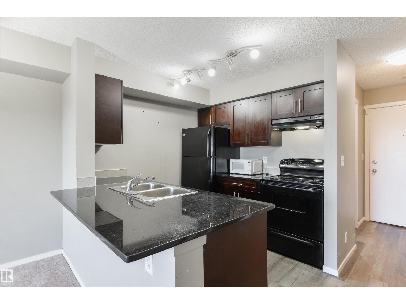 #320 1510 Watt Dr Sw Property Photo 3