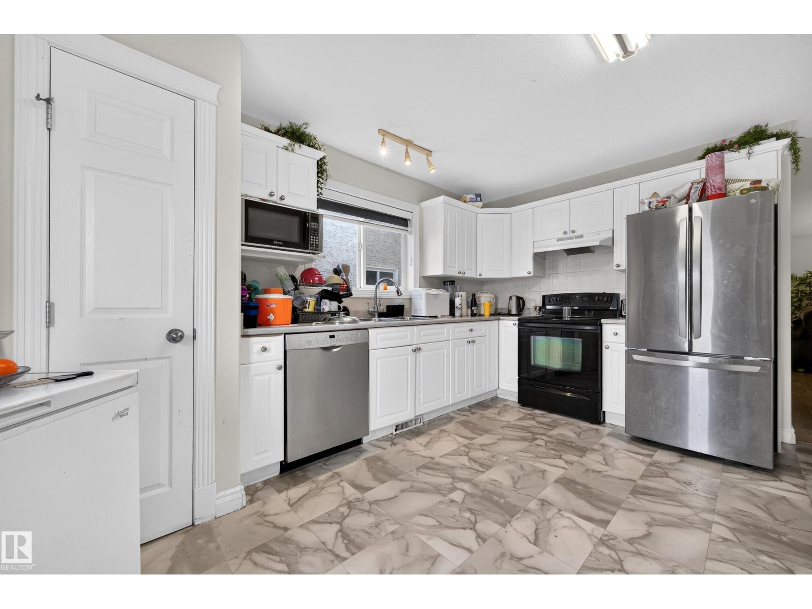 7718 166a Av Nw Property Photo 23