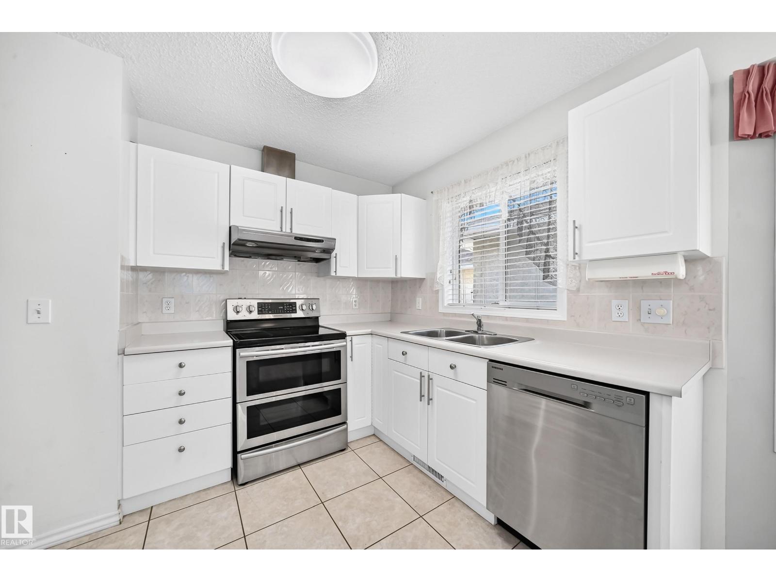 #35 14428 Miller Bv Nw Property Photo 5