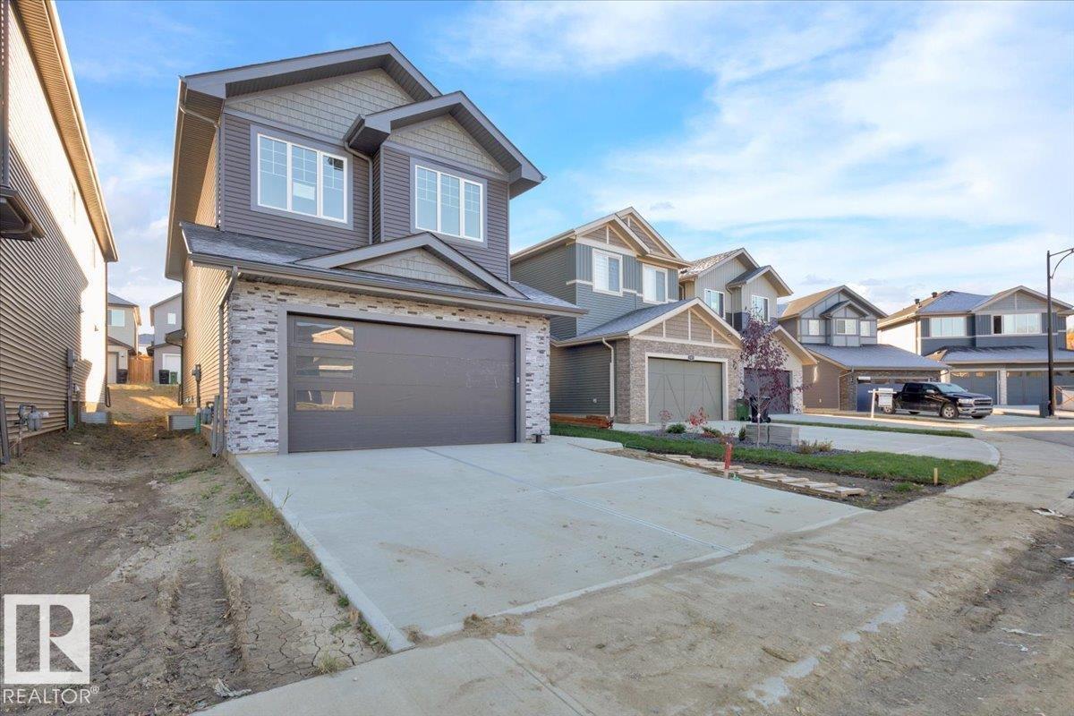 1115 Gyrfalcon Cr Nw Property Photo 2