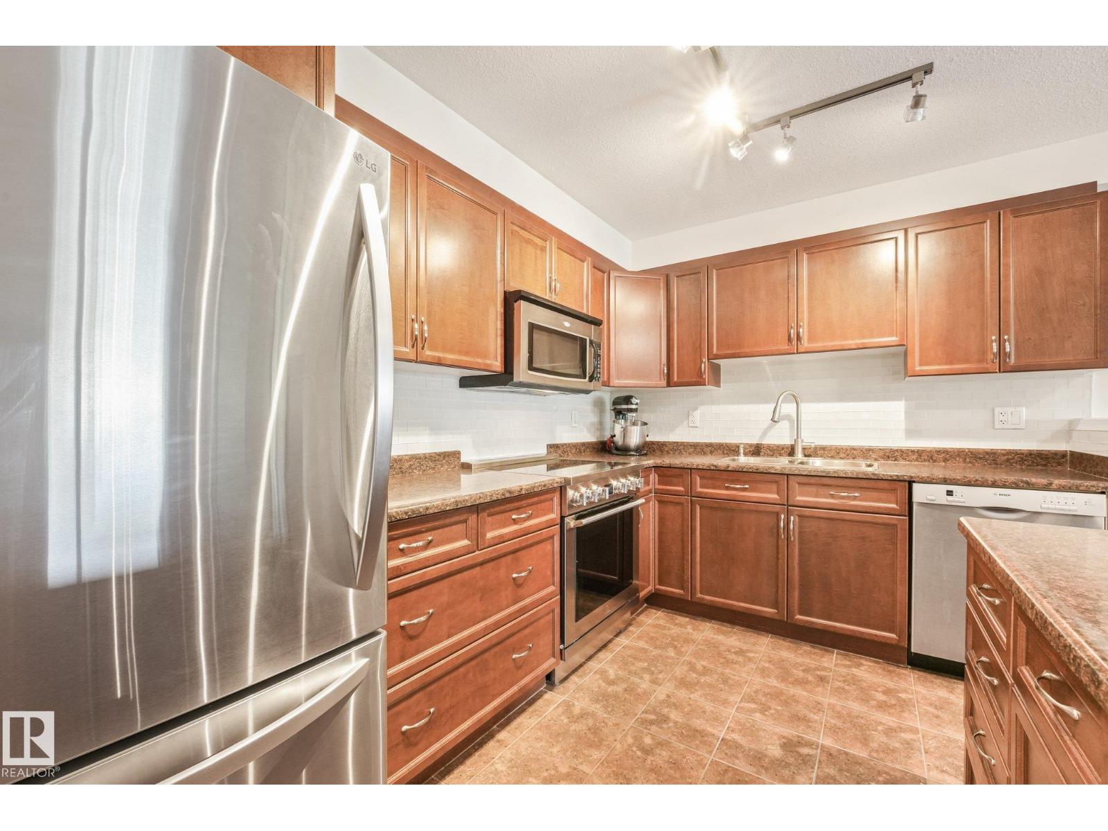 #209 1589 Glastonbury Bv Nw Property Photo 1