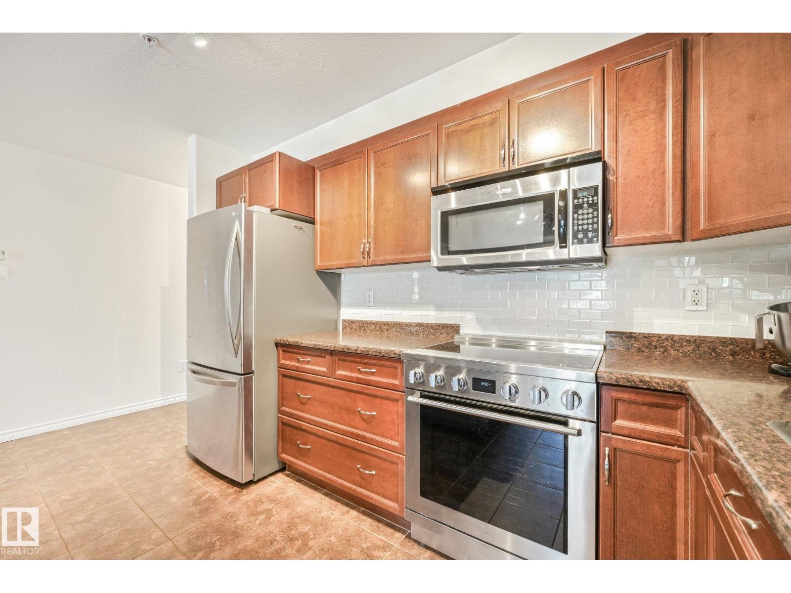 #209 1589 Glastonbury Bv Nw Property Photo 2