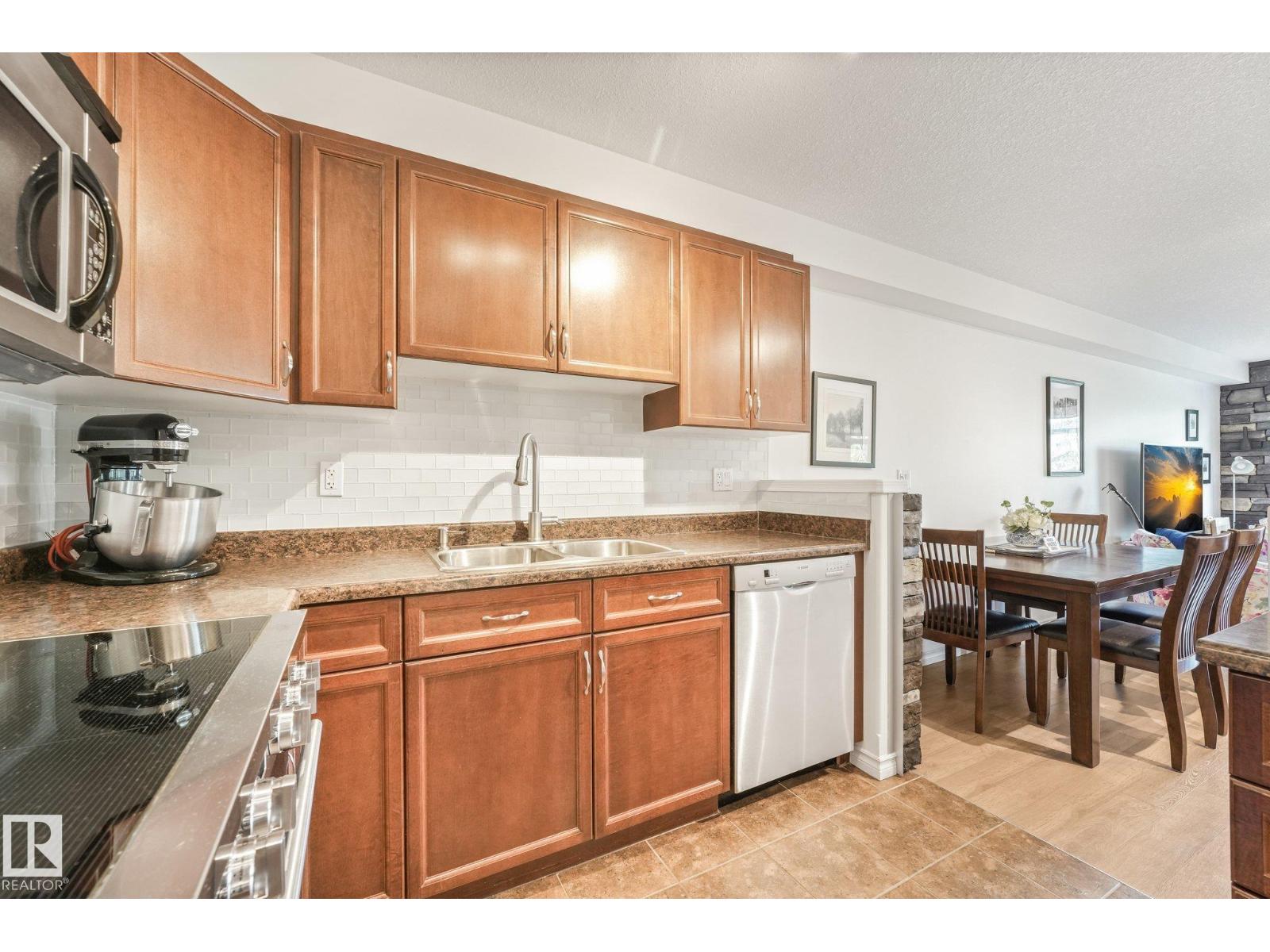 #209 1589 Glastonbury Bv Nw Property Photo 4