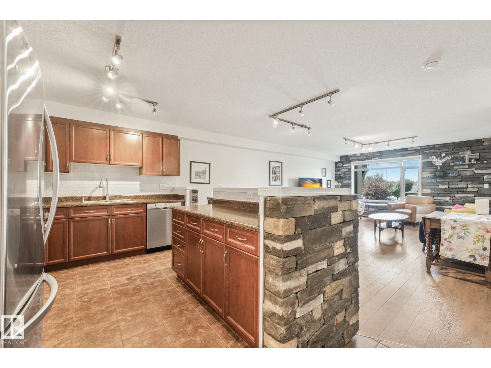#209 1589 Glastonbury Bv Nw Property Photo 5