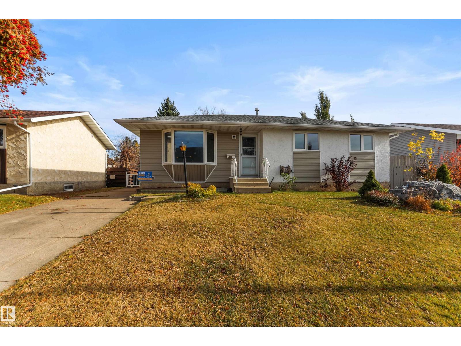 48 PIPESTONE DR Property Photo 1