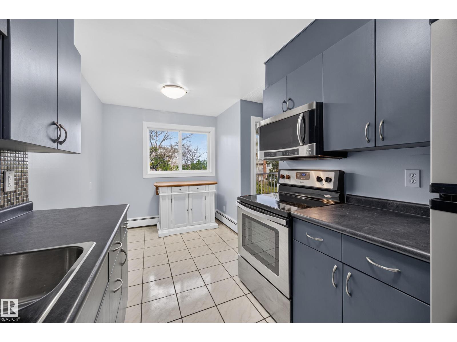 #27 11245 31 Av Nw Property Photo 16