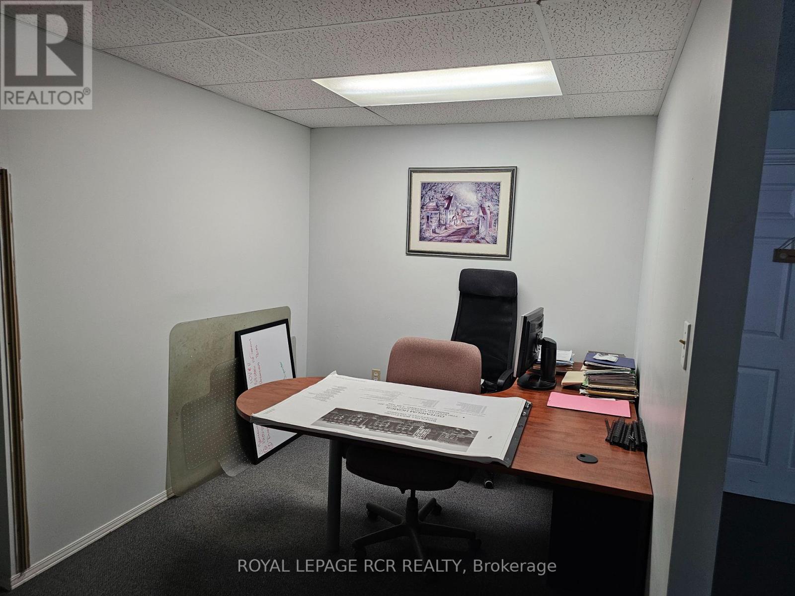 Lower Cubicle - 411 Queen Street Property Photo 5