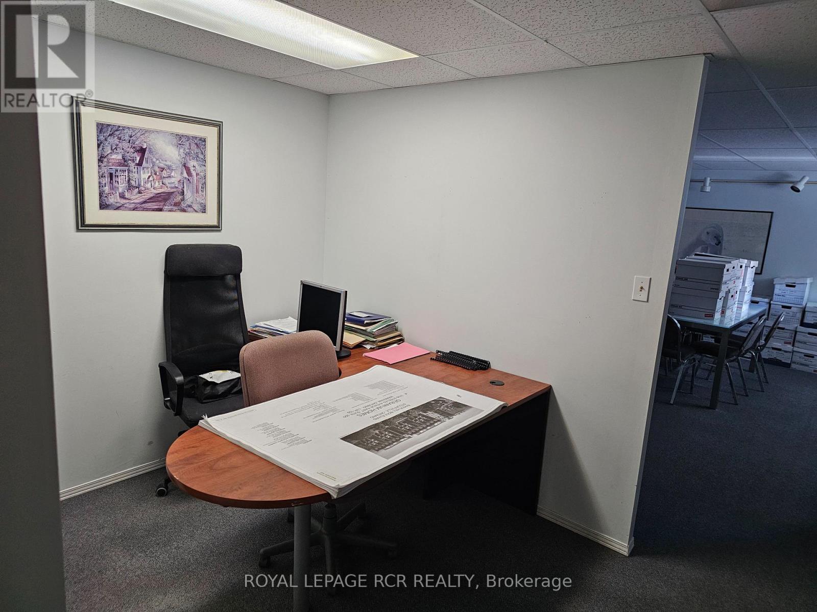 Lower Cubicle - 411 Queen Street Property Photo 7