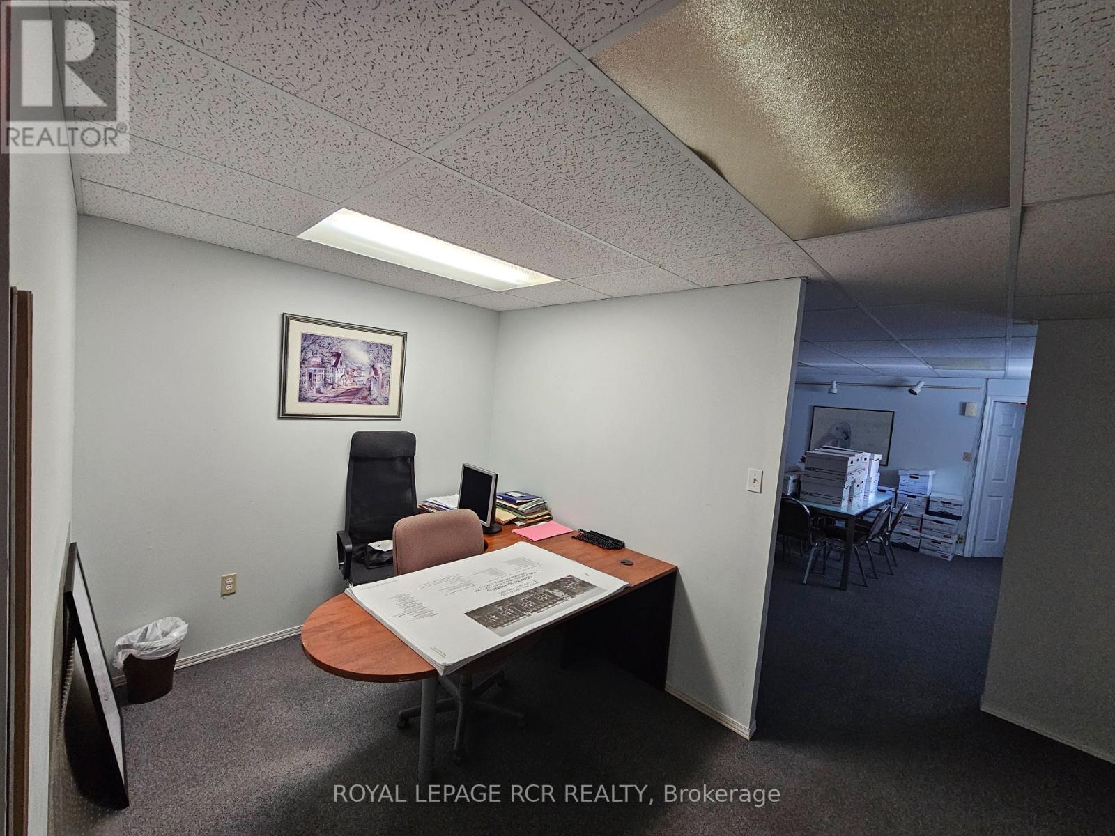 Lower Cubicle - 411 Queen Street Property Photo 8