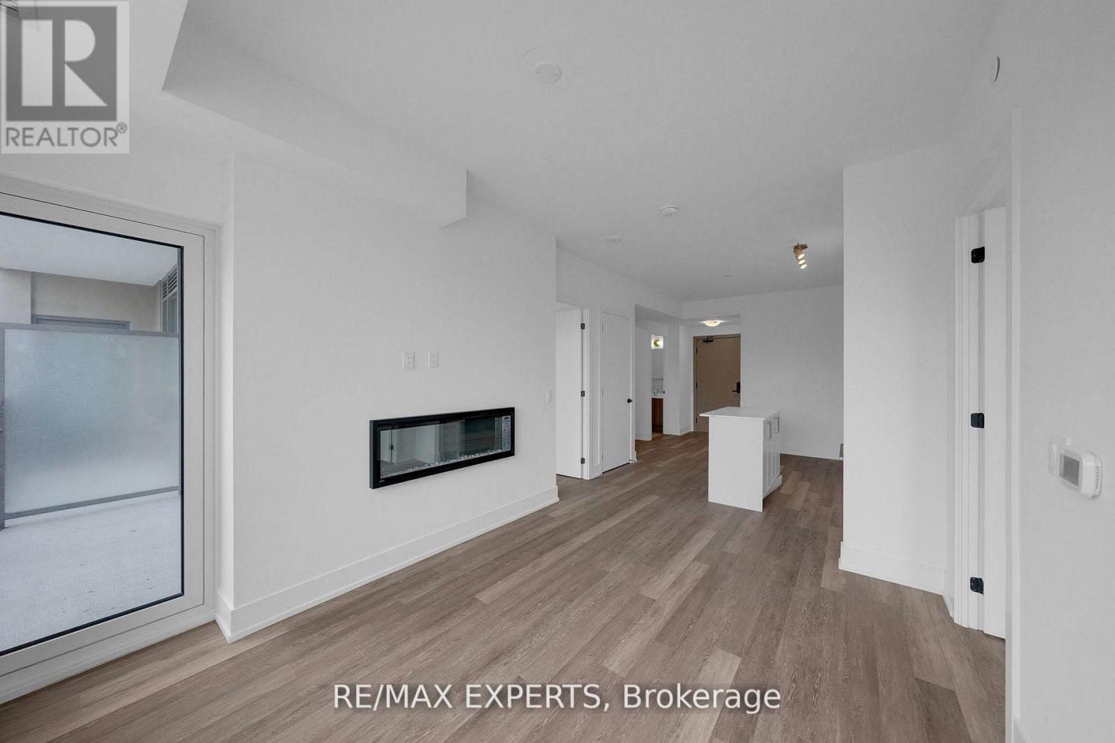 203 - 2075 King Road Property Photo 11