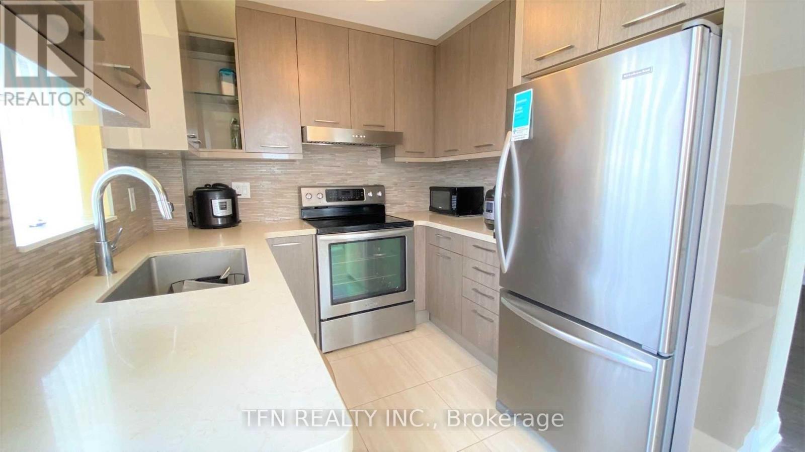704 - 310 Red Maple Road Property Photo 1
