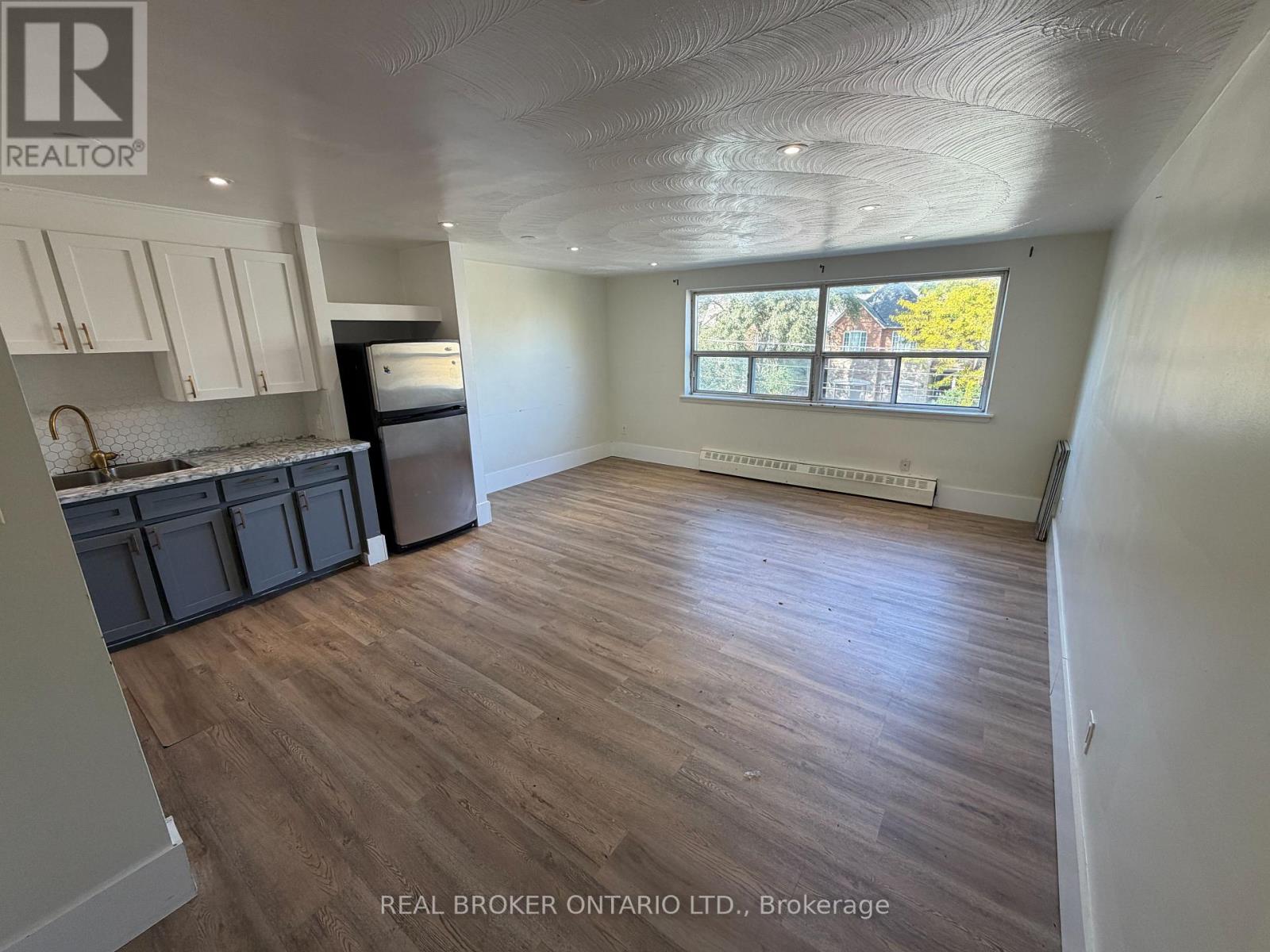 202 - 50 Benson Avenue Property Photo 1