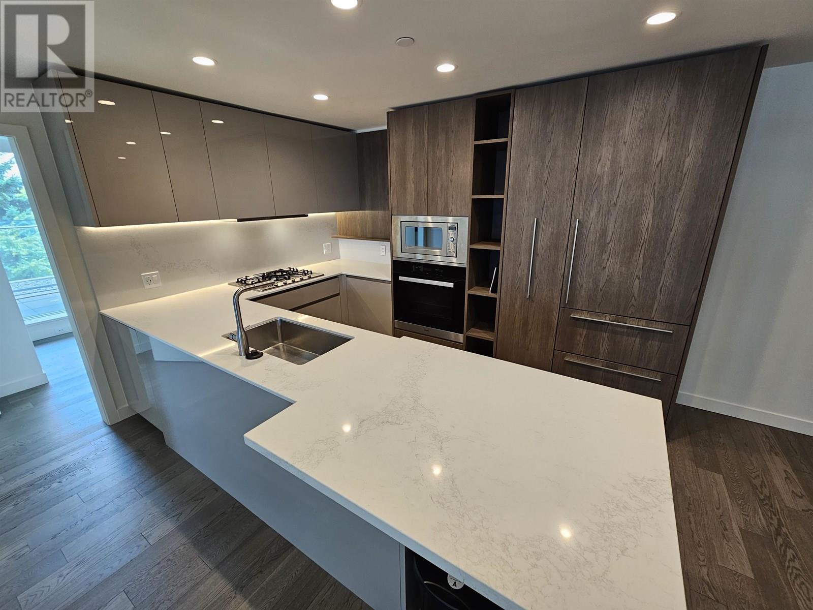 306 6855 PEARSON WAY Property Photo 1
