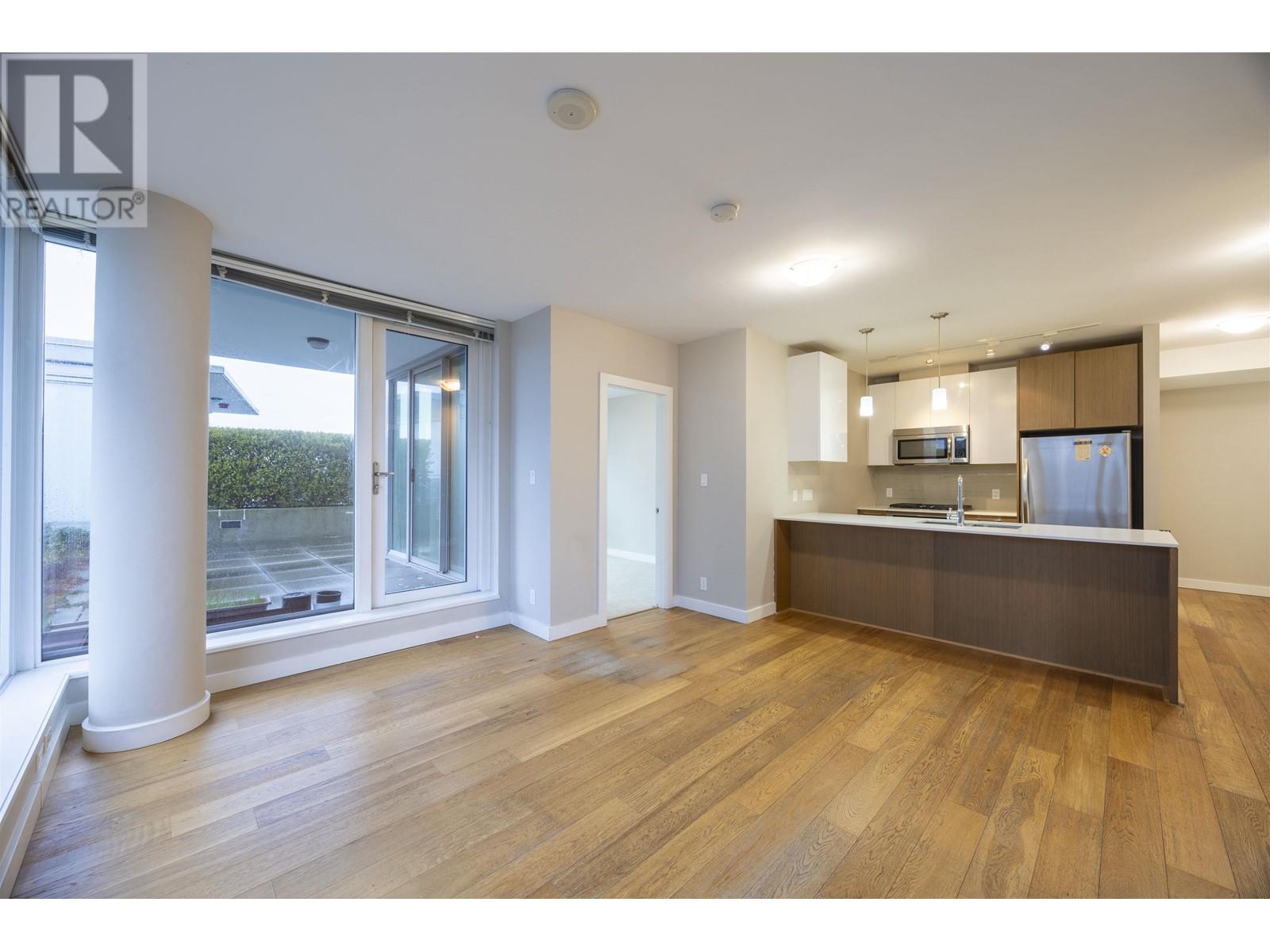 702 6951 Elmbridge Way Property Photo 2