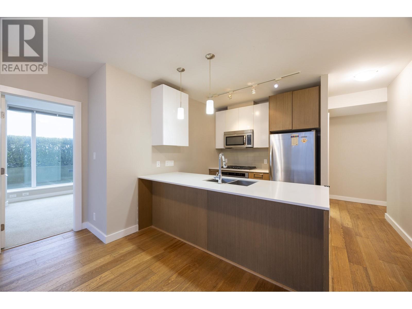 702 6951 Elmbridge Way Property Photo 3