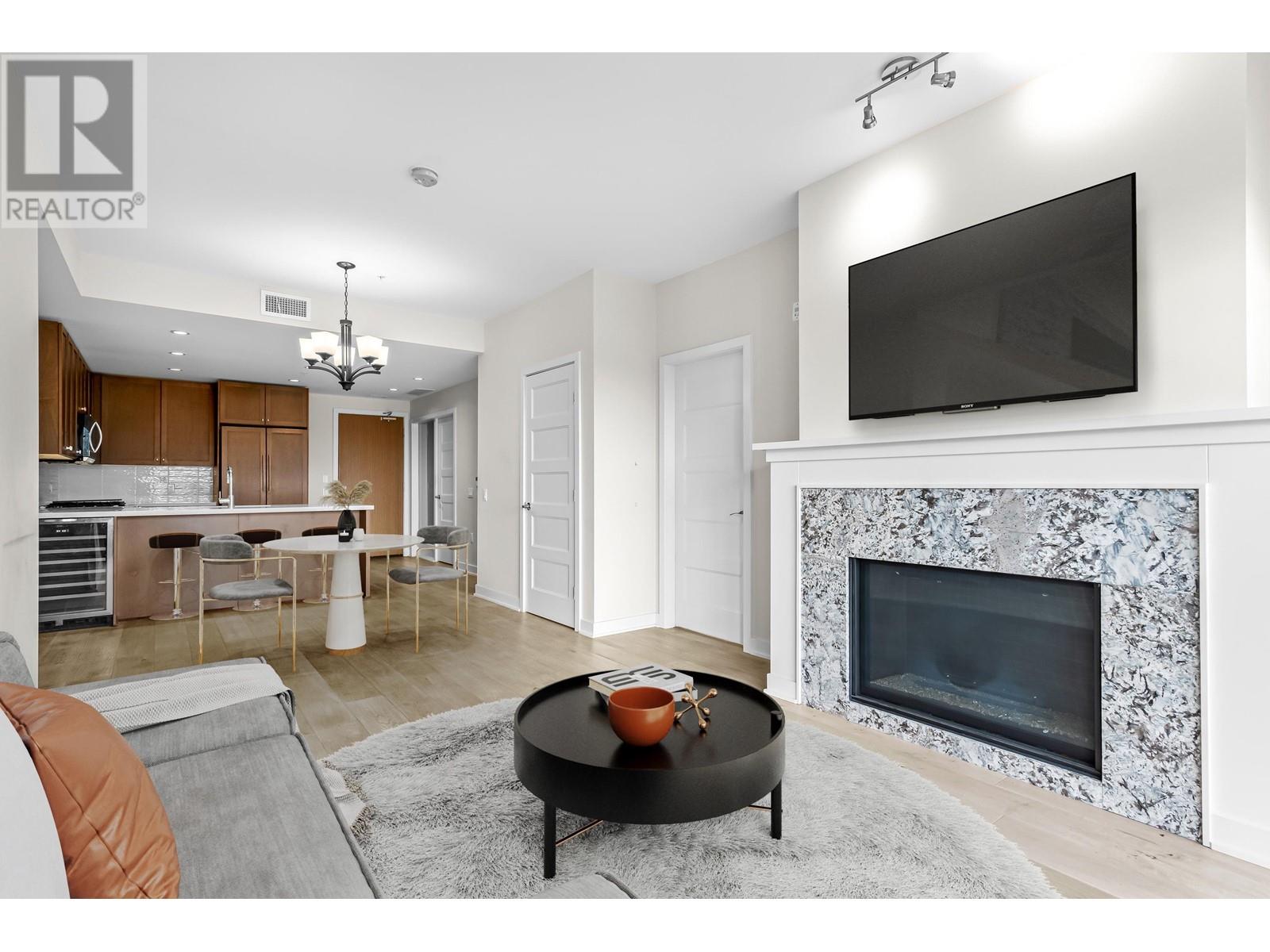 210 6168 LONDON ROAD Property Photo 1