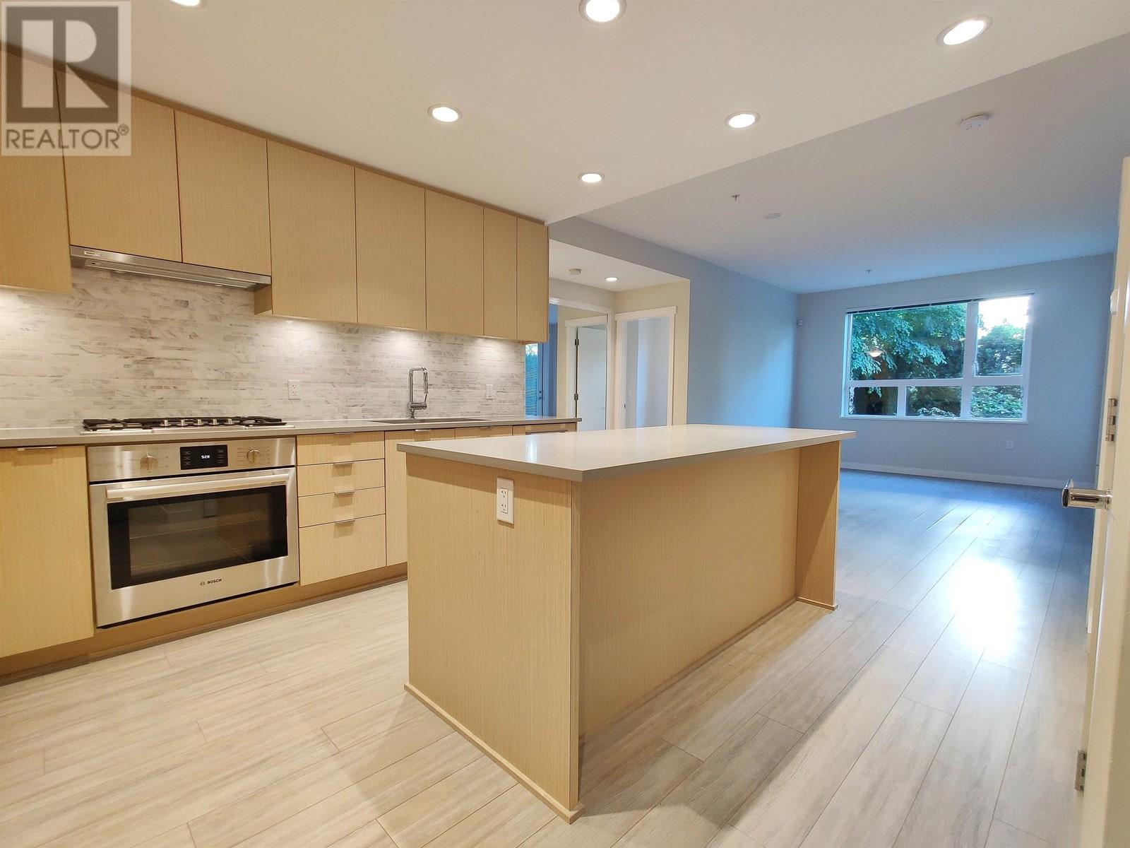 122 9213 Odlin Road Property Photo 1