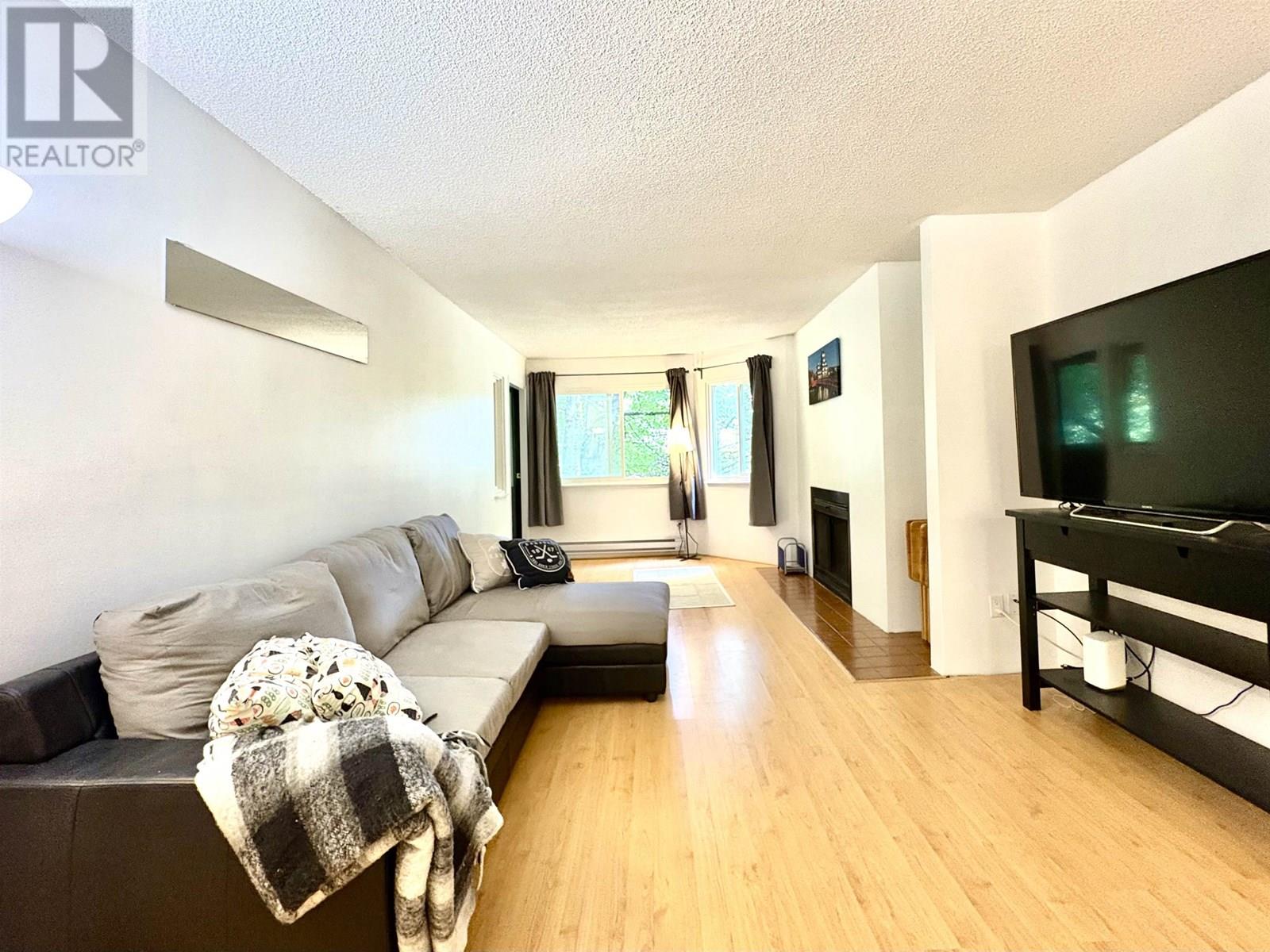 312 9880 MANCHESTER DRIVE Property Photo 1
