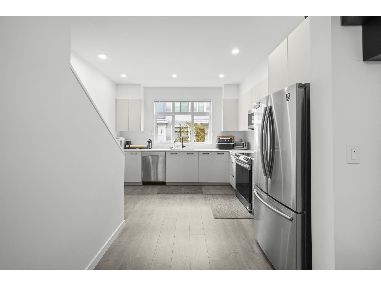 150 15235 Sitka Drive Property Photo 1